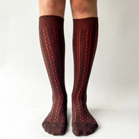 Cable knit knee high socks by OKAYOK