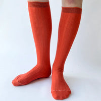 Knee-high wool socks by OKAYOK