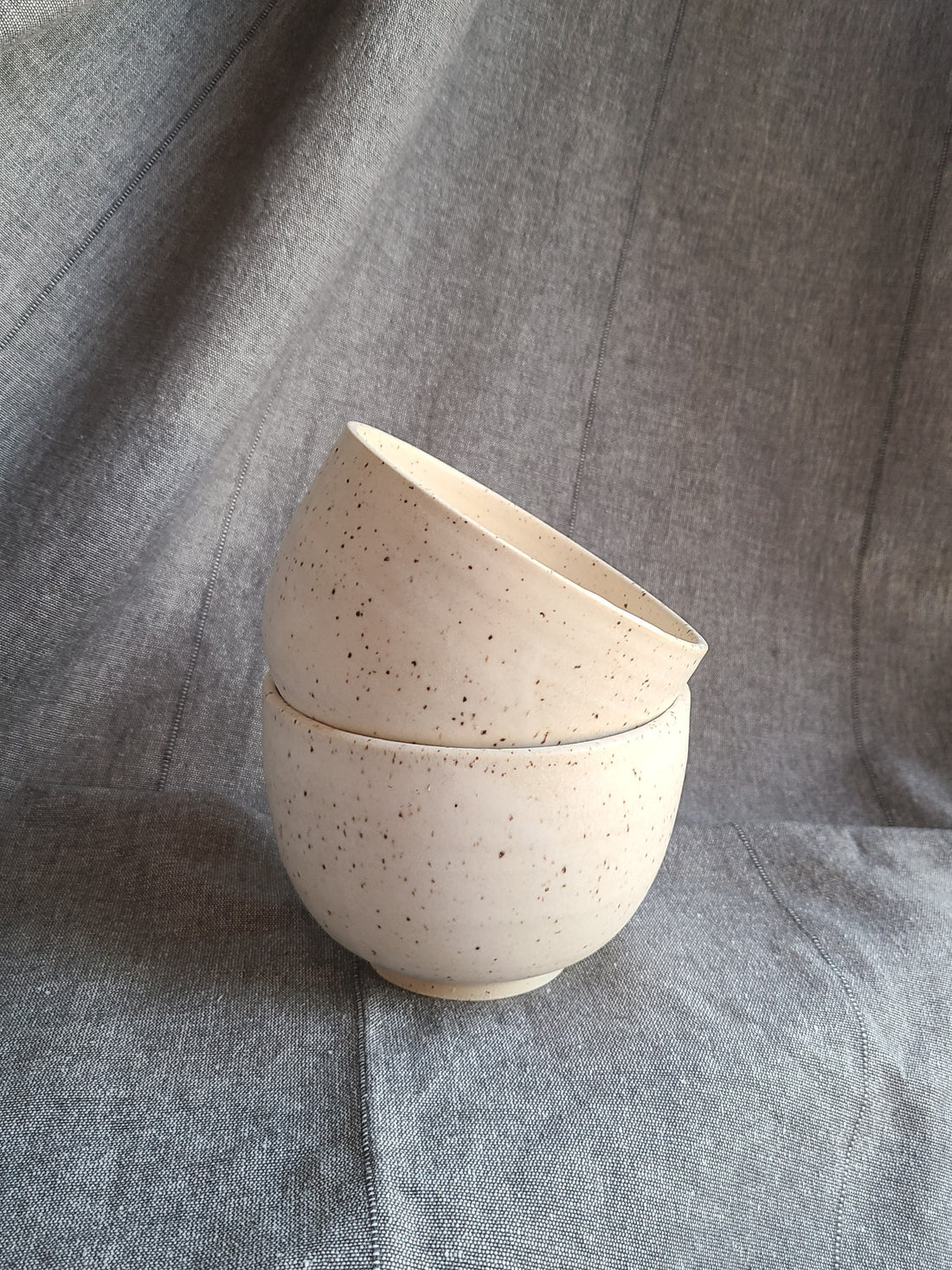 Speckled breakfast bowl by Ed Poterie