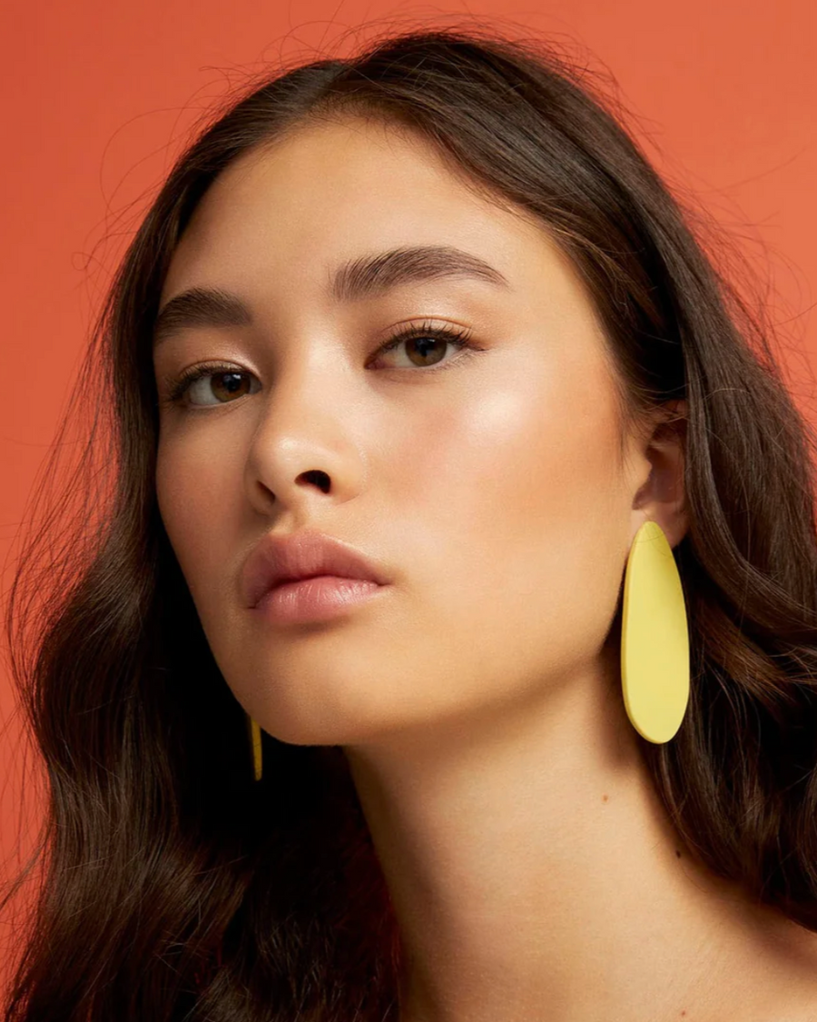ESE X APA earrings by Adé, melon