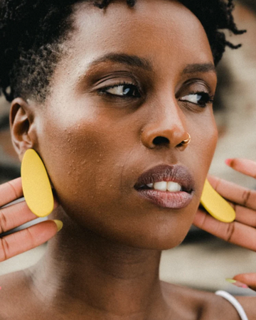 ESE X APA earrings by Adé, melon