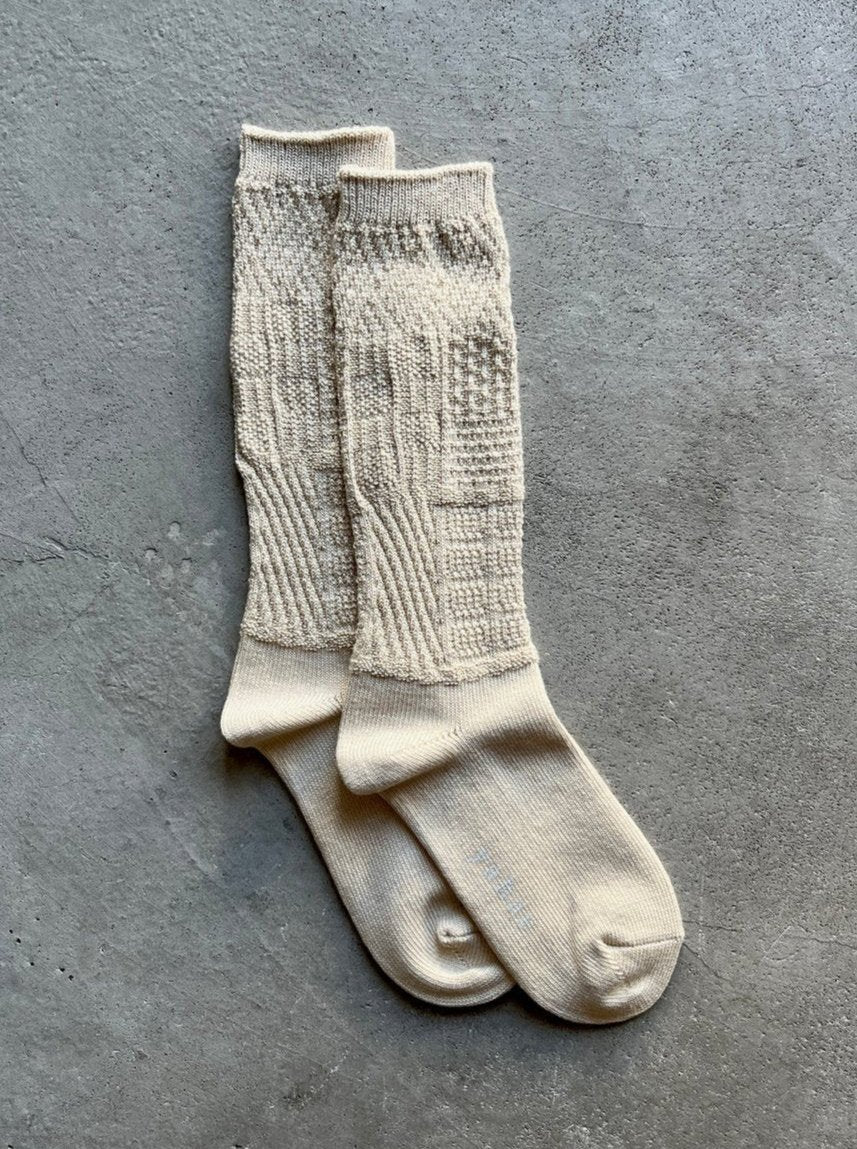 Mosaic textured socks by Yahae