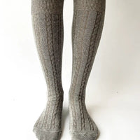 Cable knit knee high socks by OKAYOK