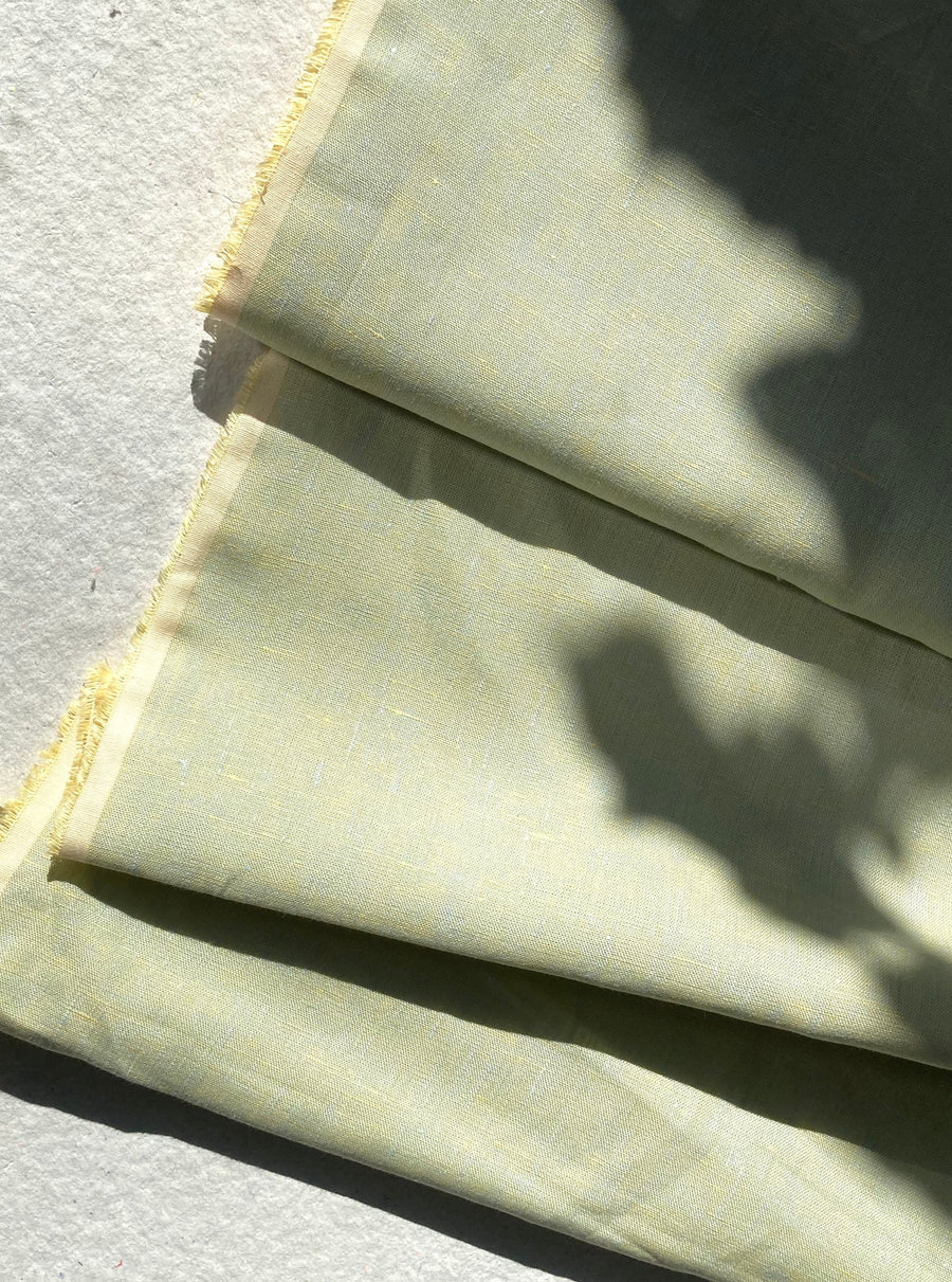 Linen marled pale yellow and blue, by the half meter