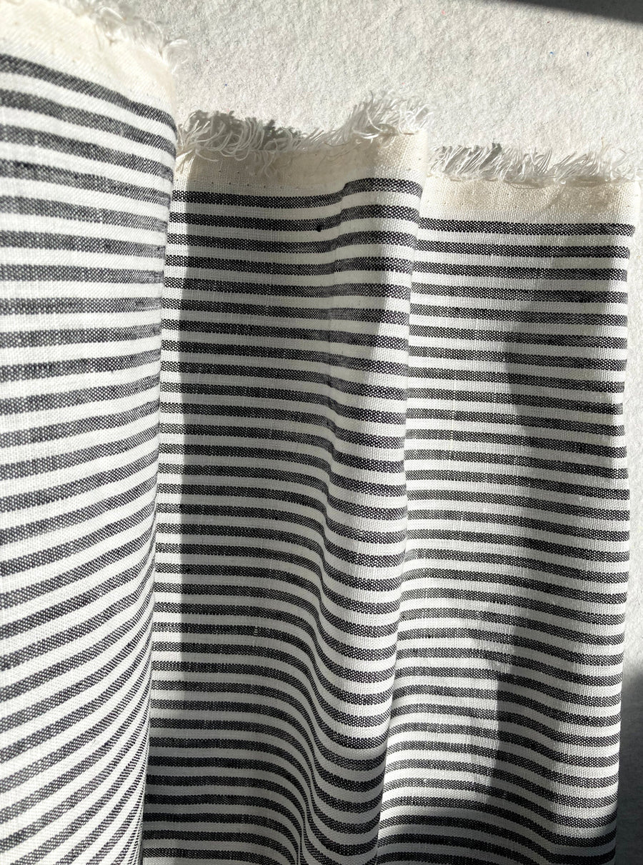 Cream and black striped linen, by the half meter
